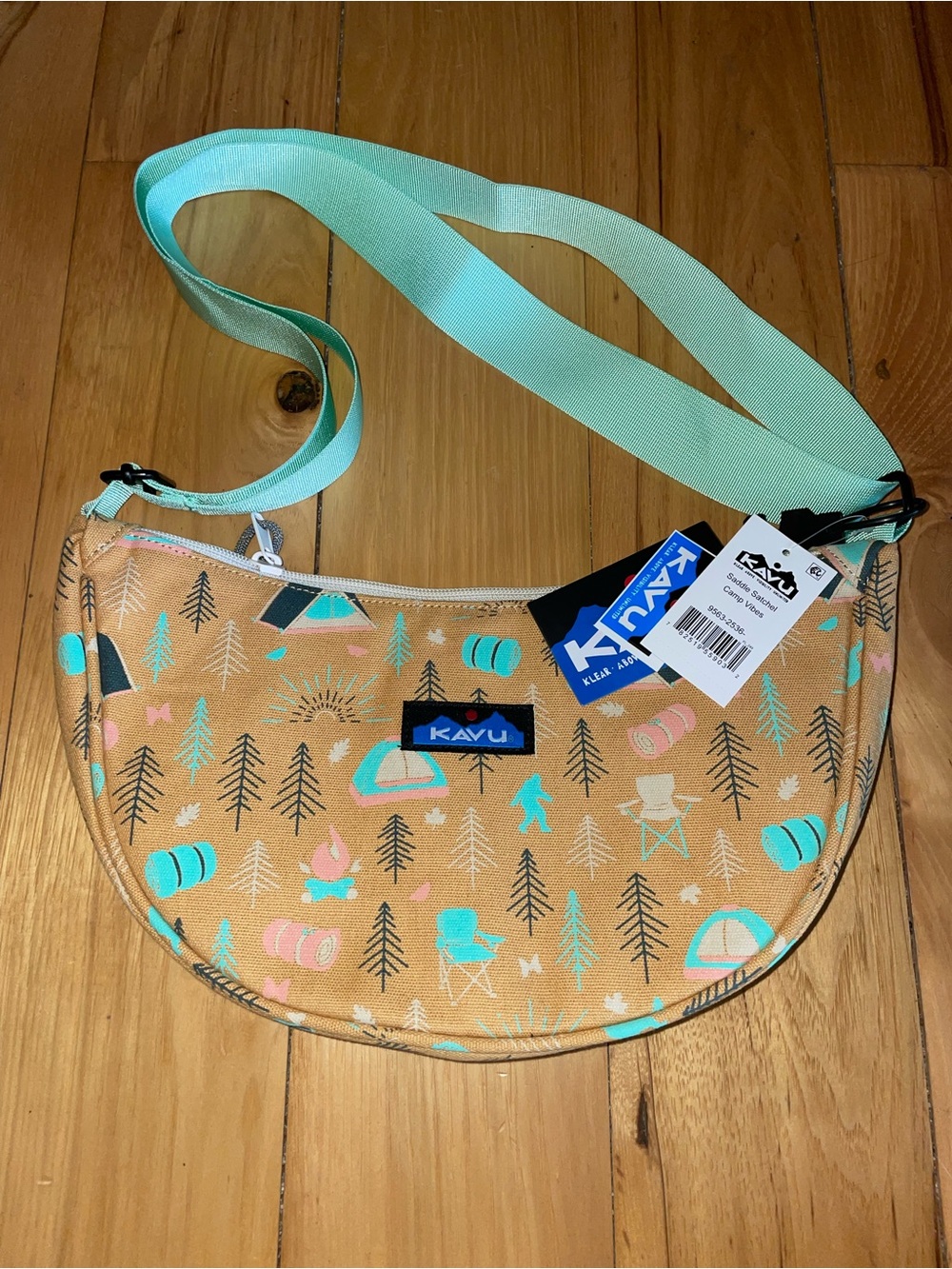 NWT Kavu Crescent Sling Bag in Tan with Mint and Pink Print